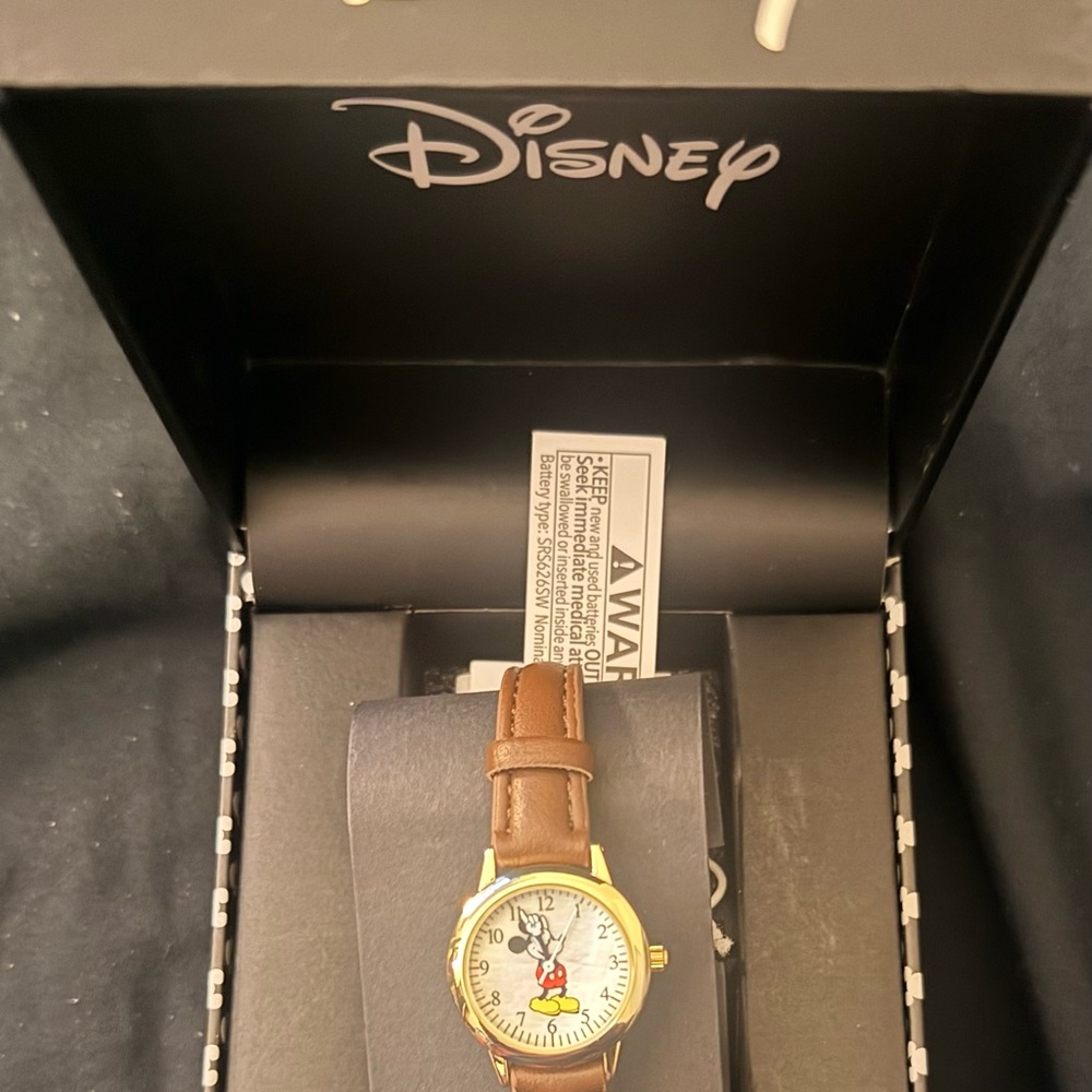 Brand new Disney Mickey Mouse Watch in Brown and Gold-Tone with black case.